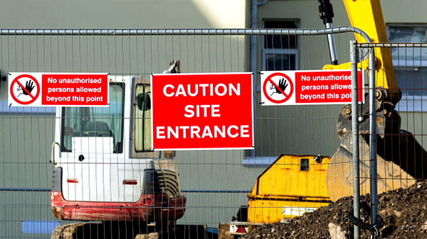 building site entrance caution sign
