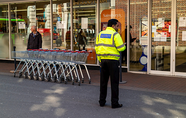 Security guard outside Sainsburys